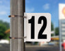 Pump Number Sign- Black on White, "12"